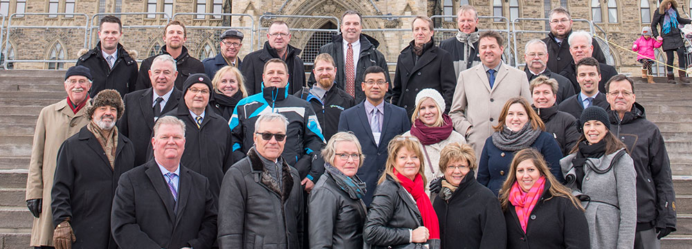 Members and staff of CPMA and CHC in front of Parliament.